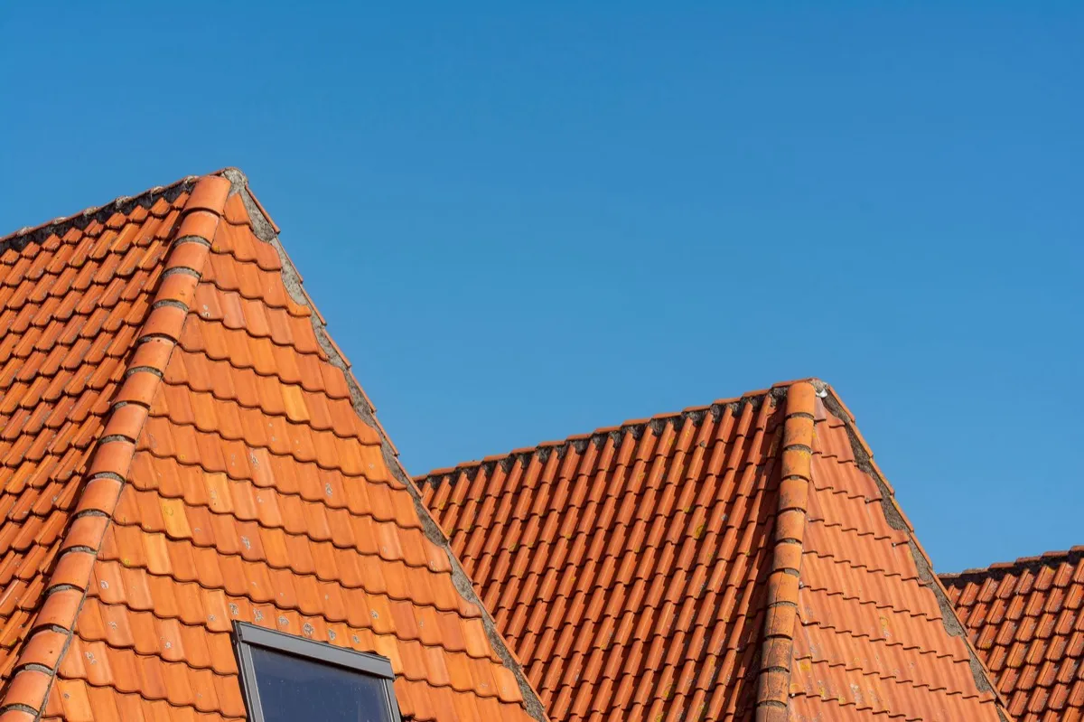 Clay barrel tile rooflines on homes in Brownwood, TX